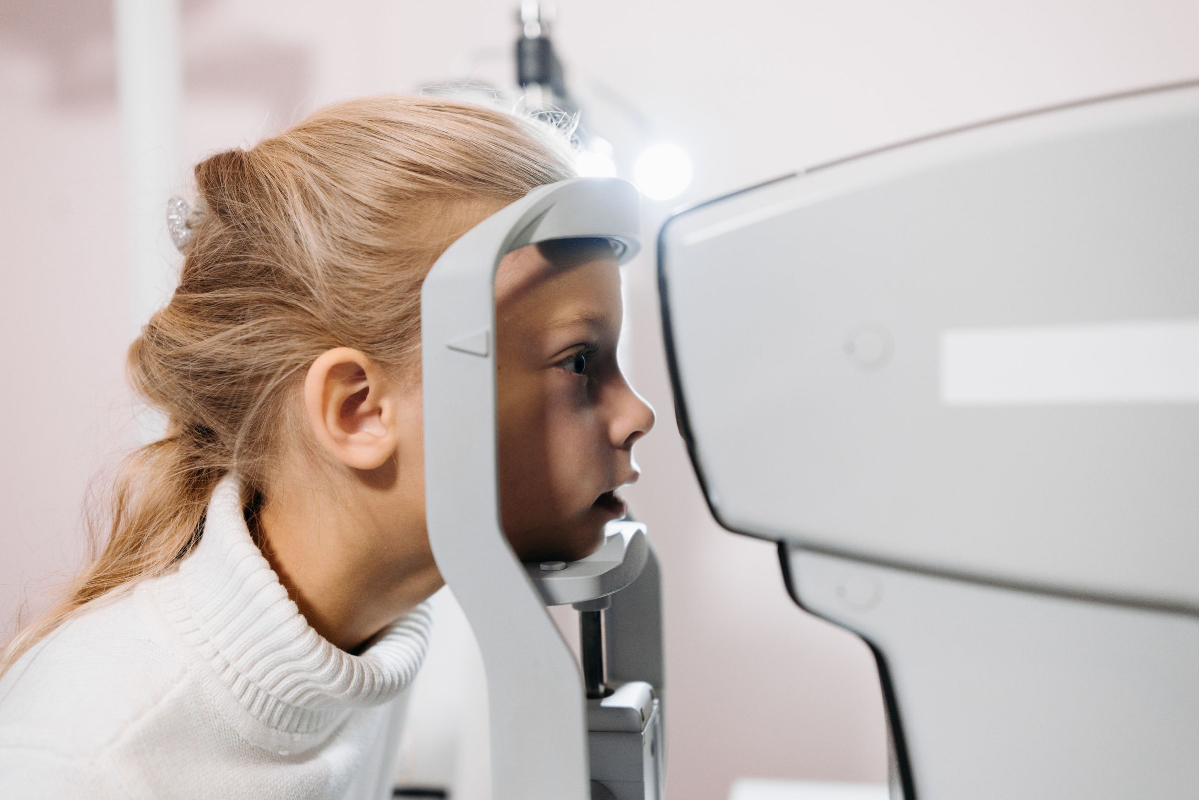 Young patient having a corneal examination